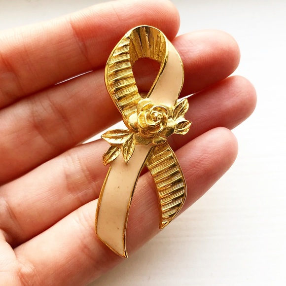 Avon Jewelry - Vintage gold & peach cancer awareness ribbon pin
